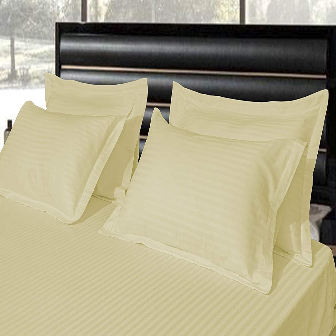 Light yellow satin stripe cotton bedsheet fabric close-up