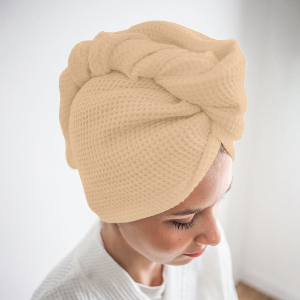 Beige cotton hair wrap towel worn after shower