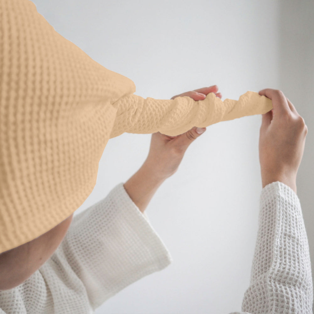 Beige waffle hair wrap towel twist and button detail