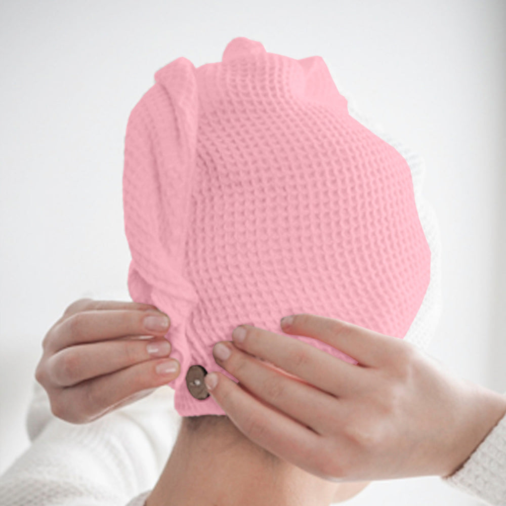 Pink cotton hair wrap towel spread flat