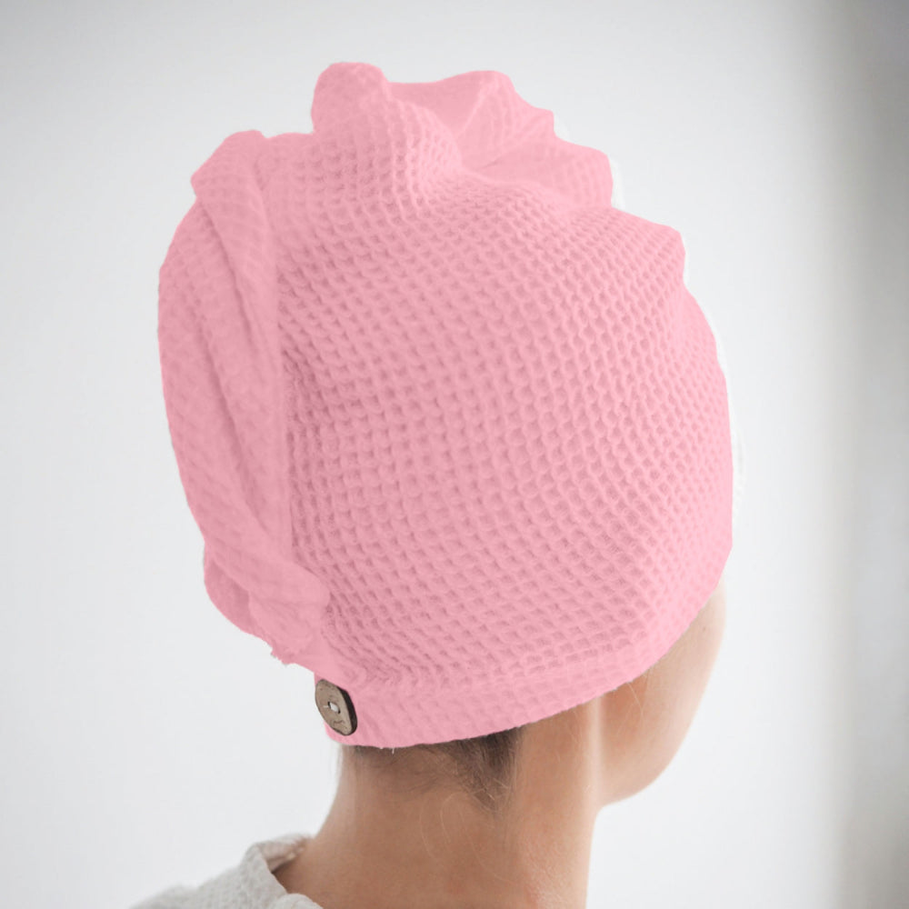 Pink waffle hair wrap towel fabric close-up