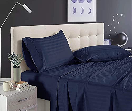 Navy blue satin stripe pillow covers on bed – view 2