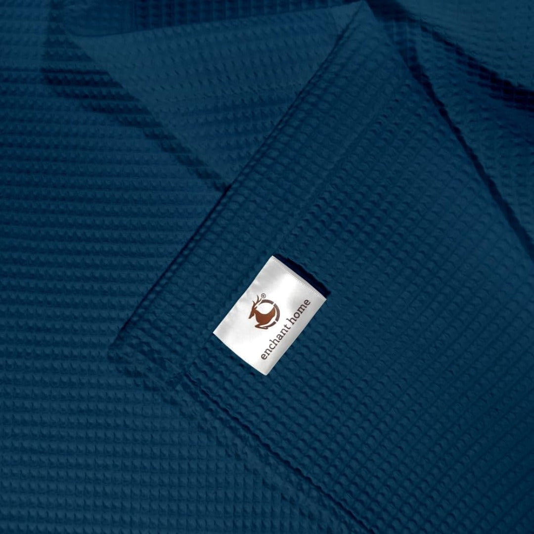 Navy blue cotton waffle hand towel folded view