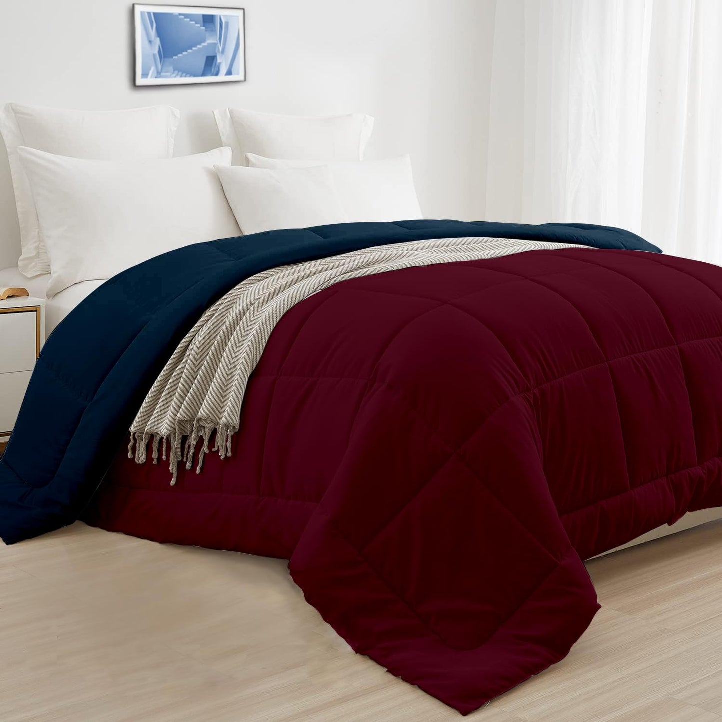 Maroon and navy blue AC comforter folded view
