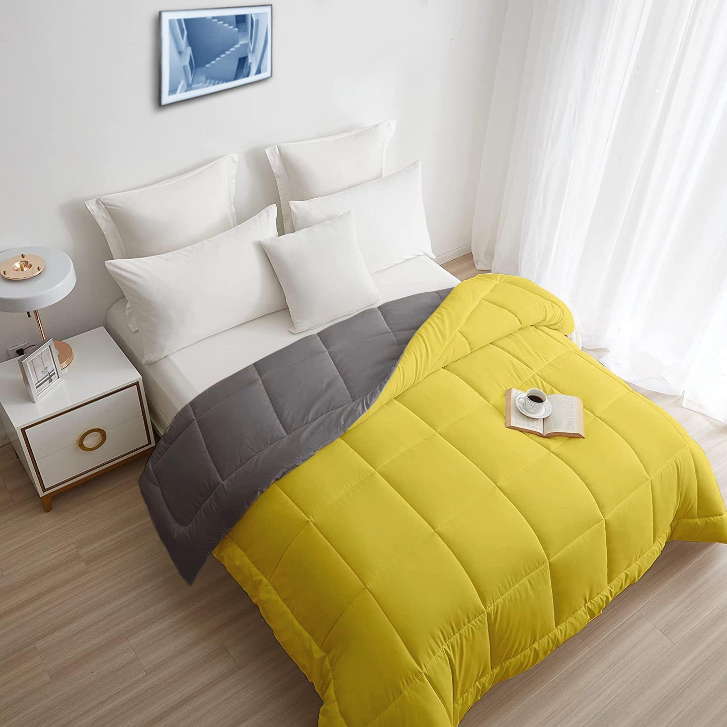 200 GSM microfiber AC comforter in yellow and grey on a bed