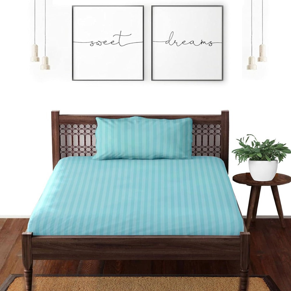 Satin striped pure cotton bedsheet in aqua on a double bed