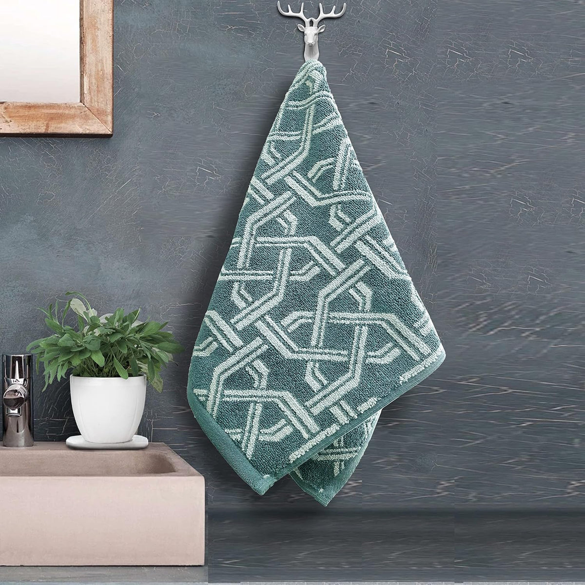 Pure cotton jacquard hand towel in geometric green pattern